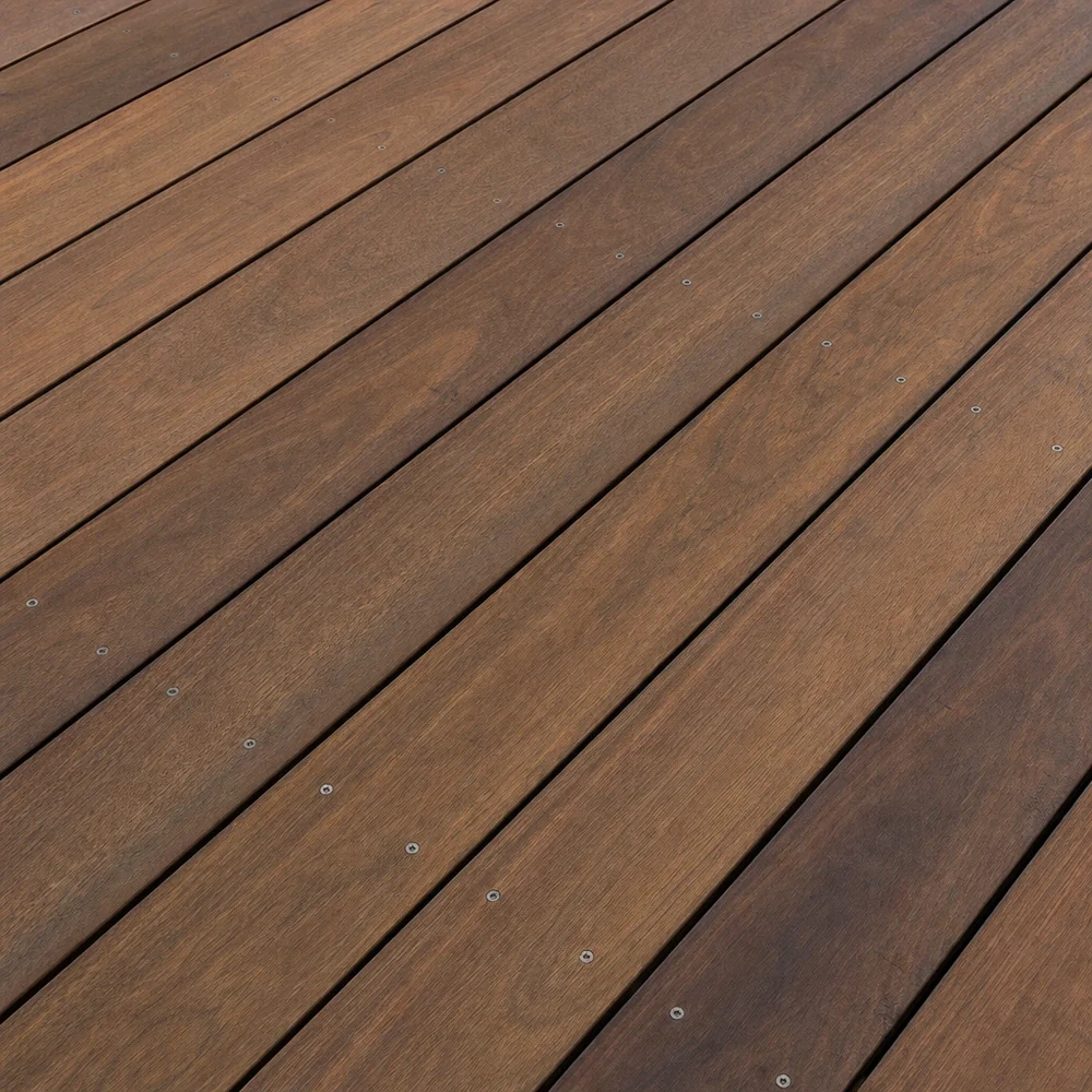 Close-up of darker restored timber deck boards laid diagonally