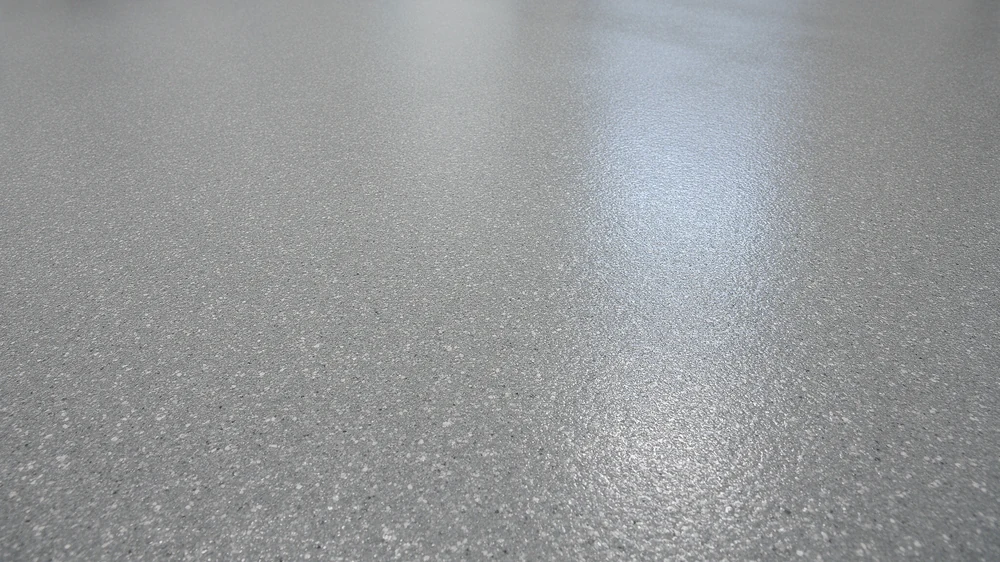 Close-up of a fine-textured grey epoxy floor with an even finish